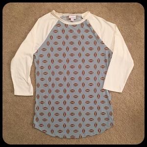 LuLaRoe Randy T small cream & blue football print